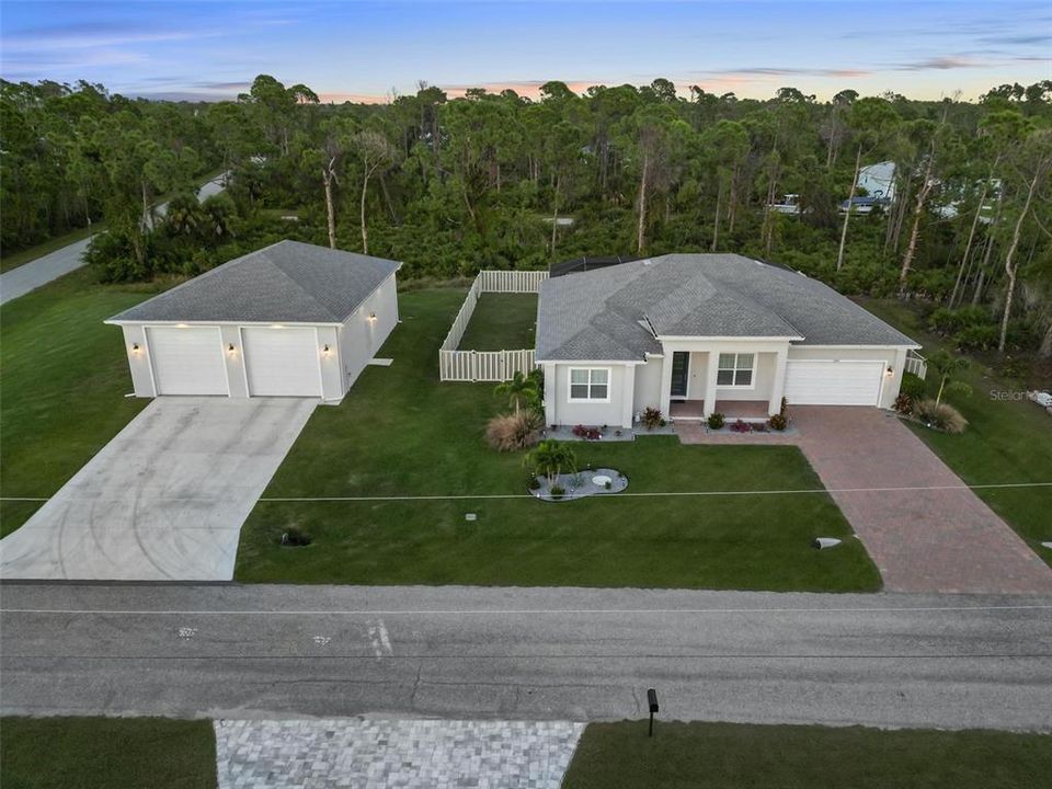 Corner Lot w/ oversized 1728 Sq Ft garage.