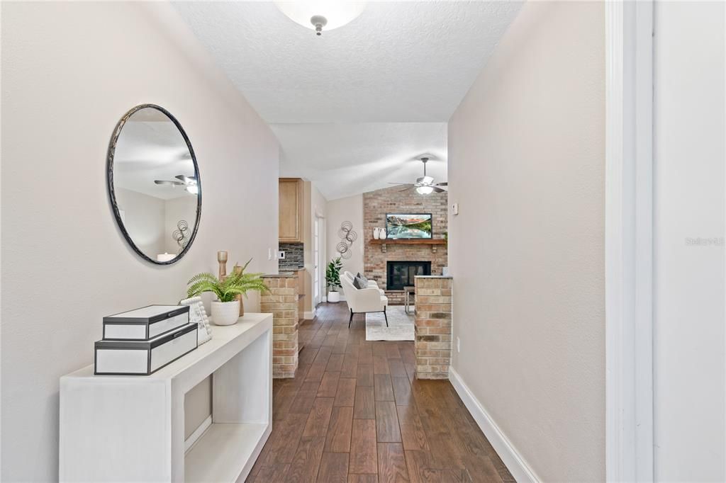 Hallway leading to main entrance and into bedrooms