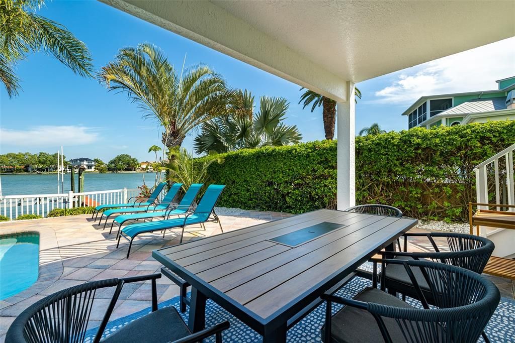 Covered patio in your own tropical oasis for dining or just taking a break from the sun.
