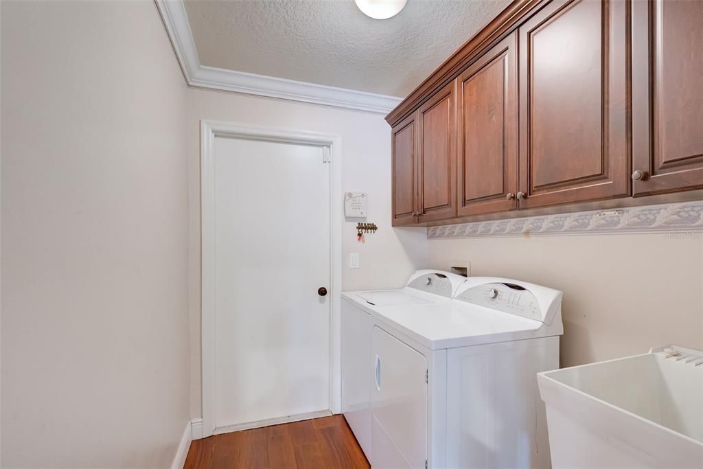 Indoor Laundry with tub sink