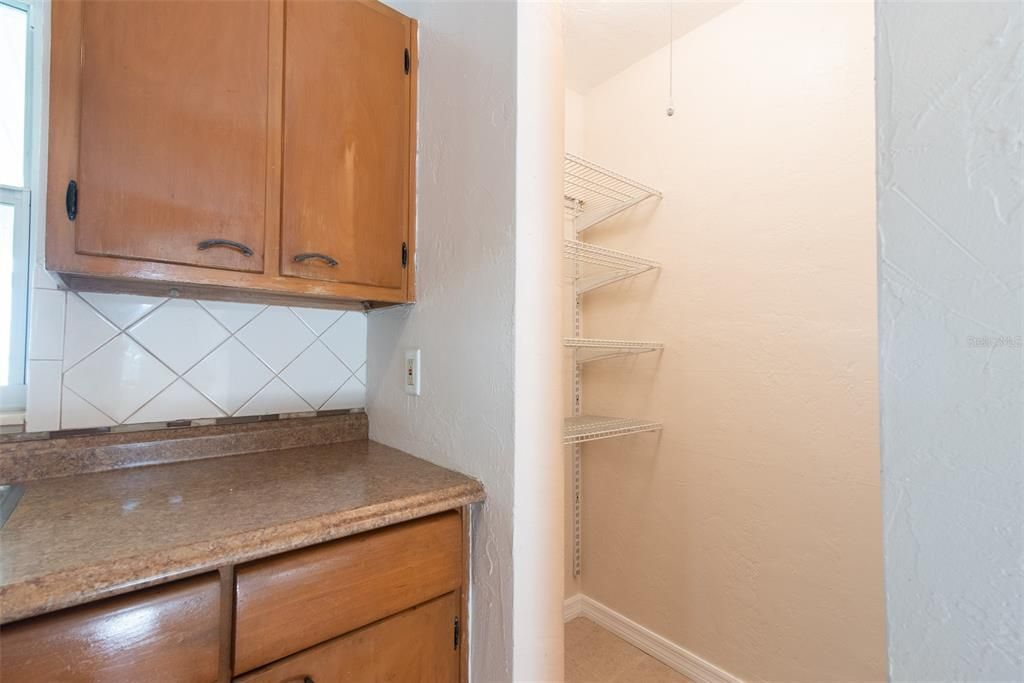 Pantry area off kitchen offers more storage