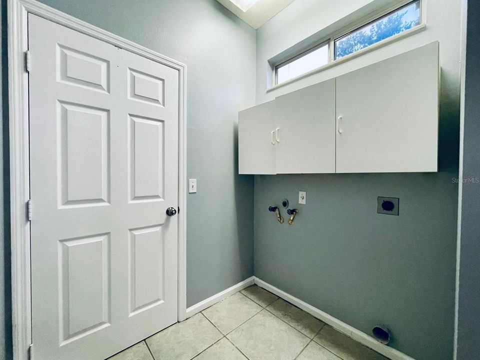 Laundry Room Between Kitchen and Garage