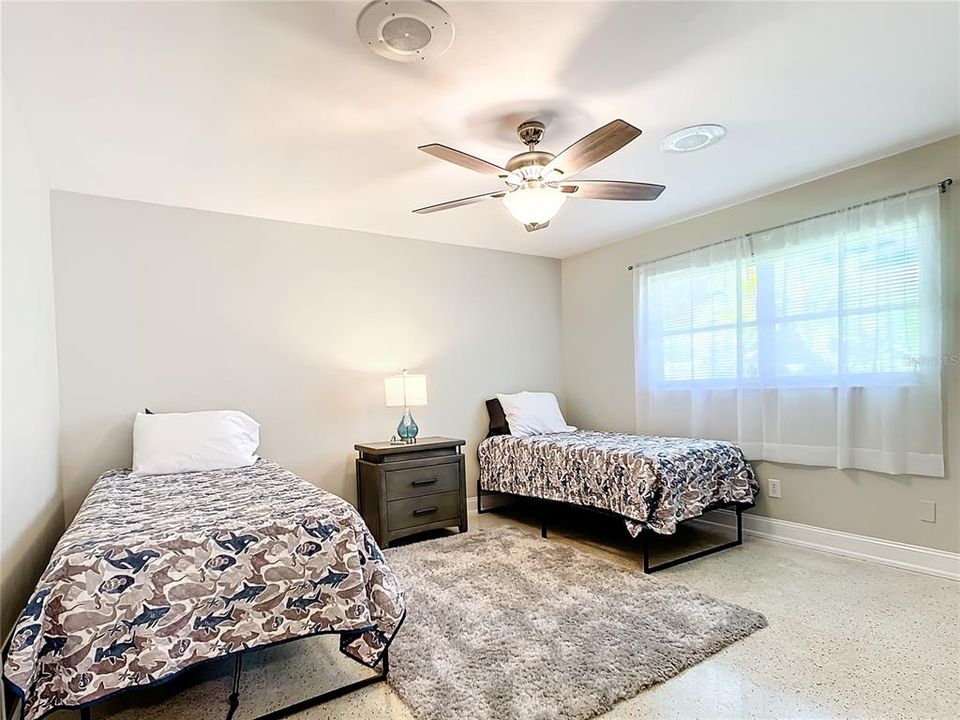 Bedroom 2 is large and currently includes 2 twin beds.    You will love the easy care Terrazzo flooring and large window!