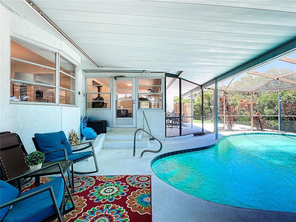 There is a wonderful screened patio/lanai and pool with a portion of the patio also covered including one end of the pool!