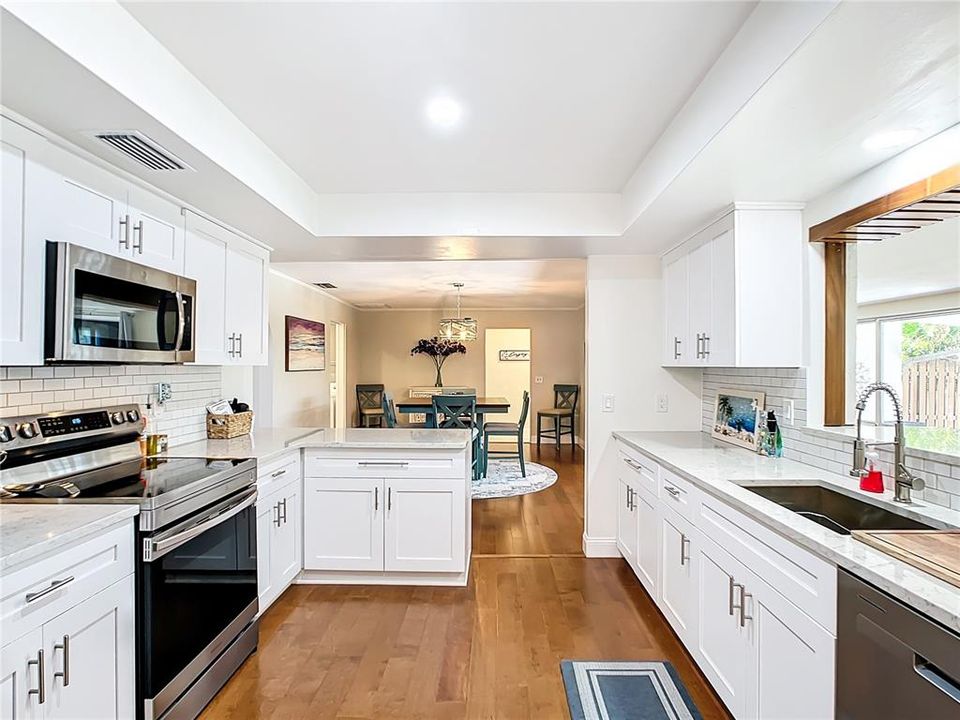 This gorgeous fully updated Kitchen is a Chef's dream and is open to the Dining Room.