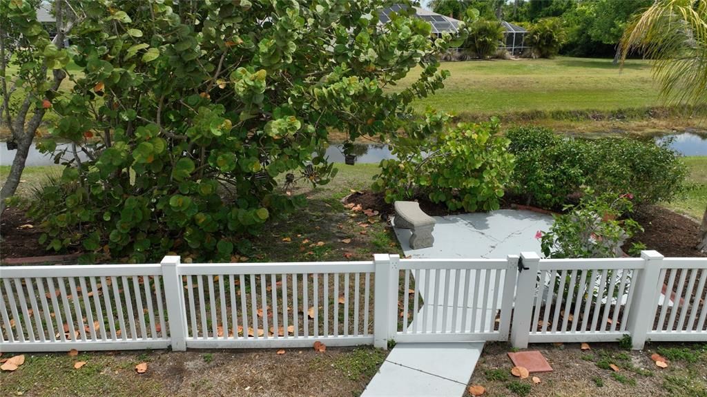 Fencing, extra patio and waterway