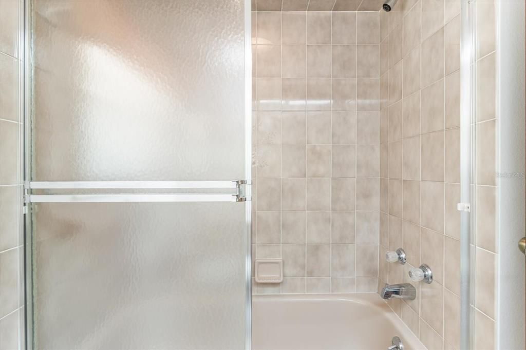 Bathroom 2 w/ Tiled Shower/Tub Combo