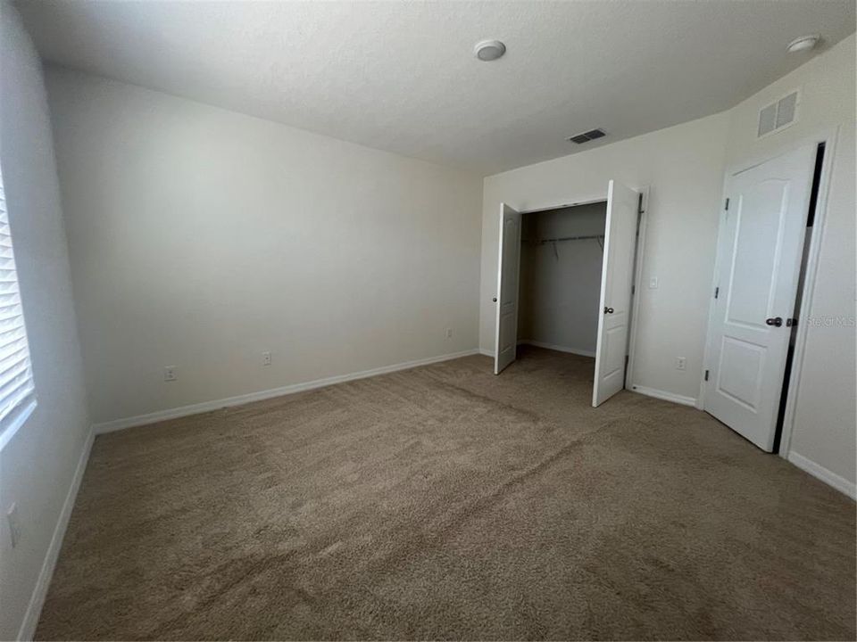 Master Bedroom, French doors to Walk in Closet