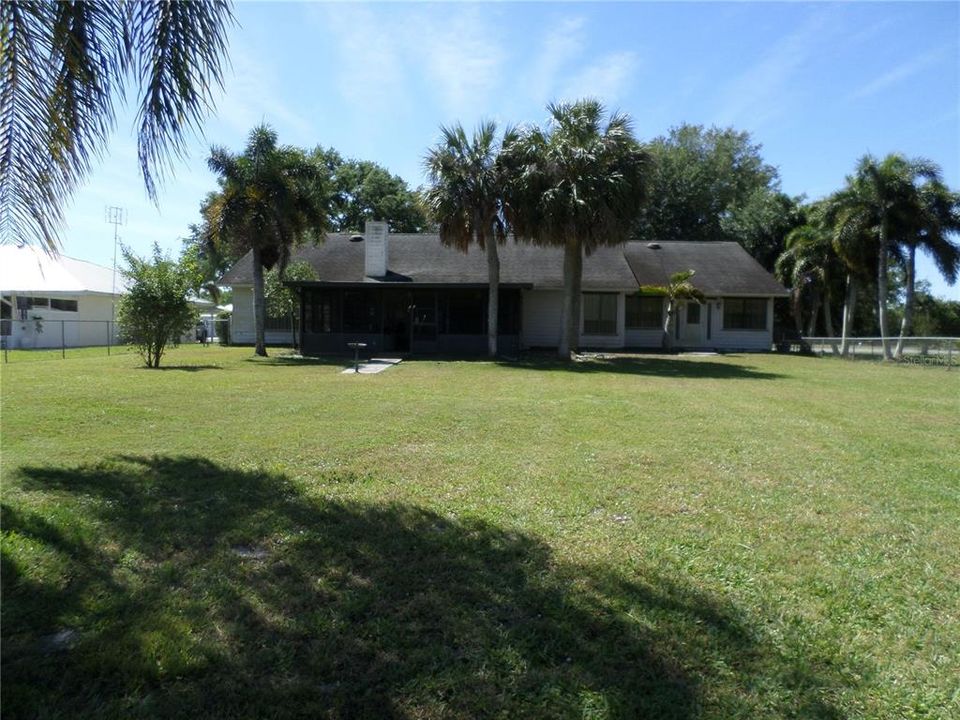 BACK OF HOME CHAIN LINK FENCED YARD