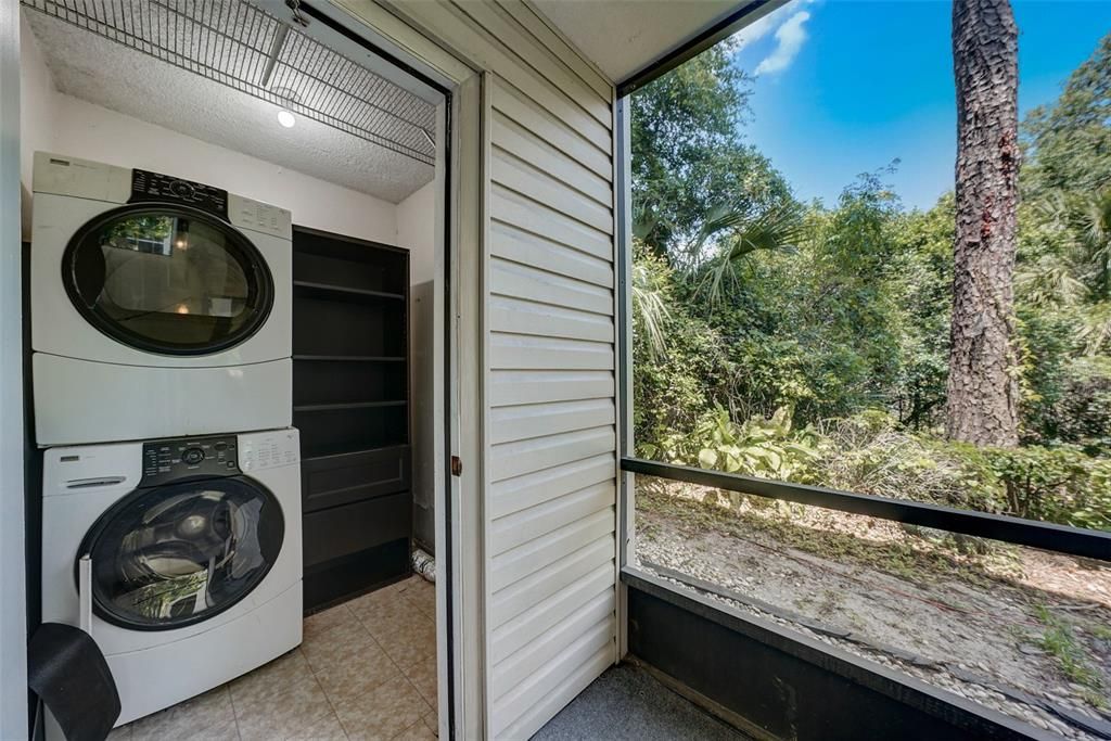 Laundry room located in the screened lanai