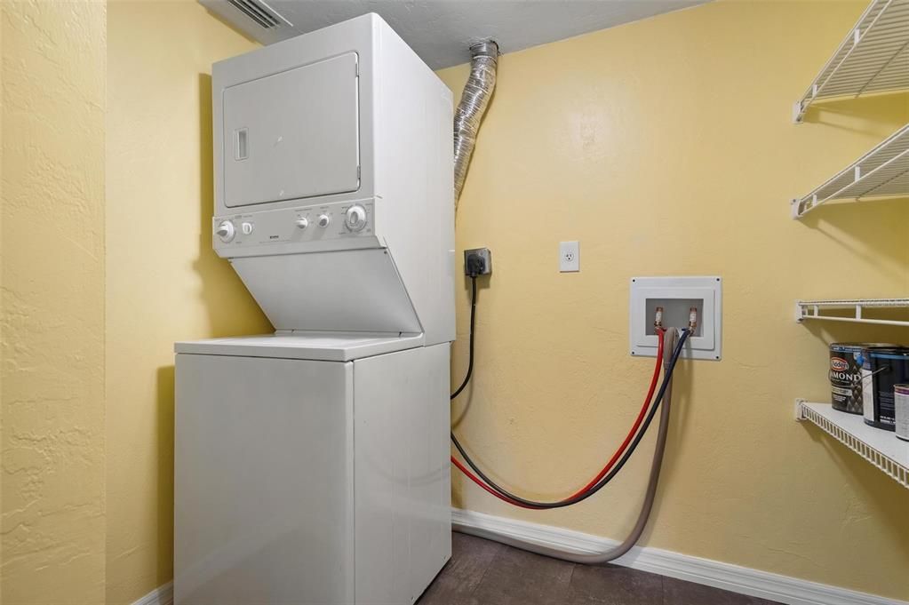 Stackable washer and dryer in separate laundry room