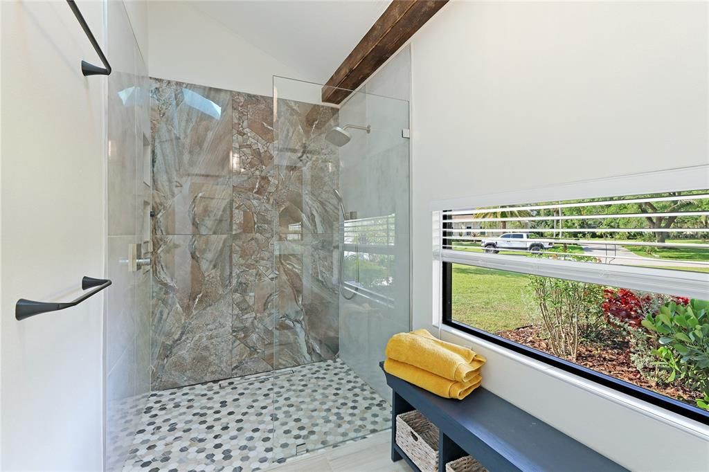En suite Shower with separate toilet behind camera