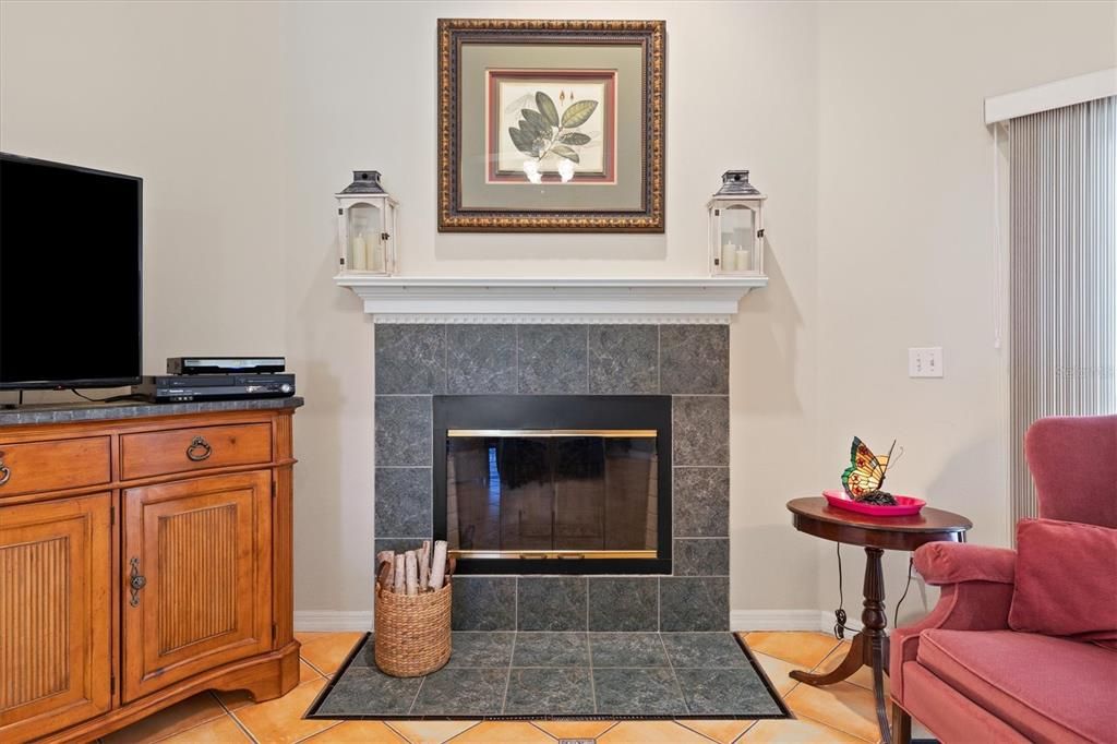 Wood-burning fireplace in family room