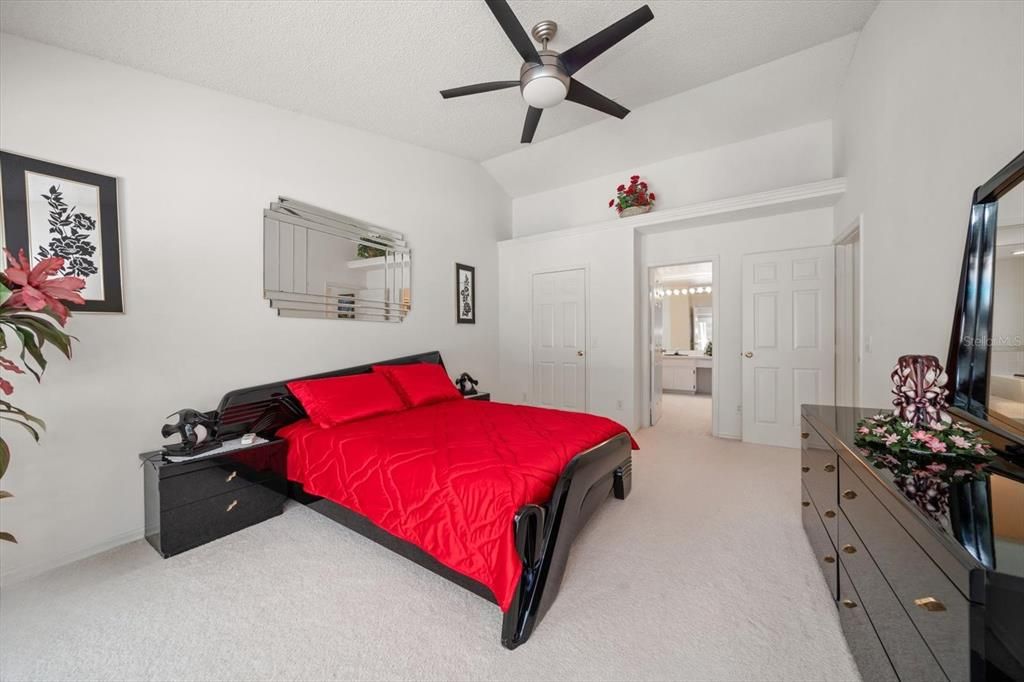 Walk-in closet & opening to ensuite. Note wood panel interior doors & architectural features~