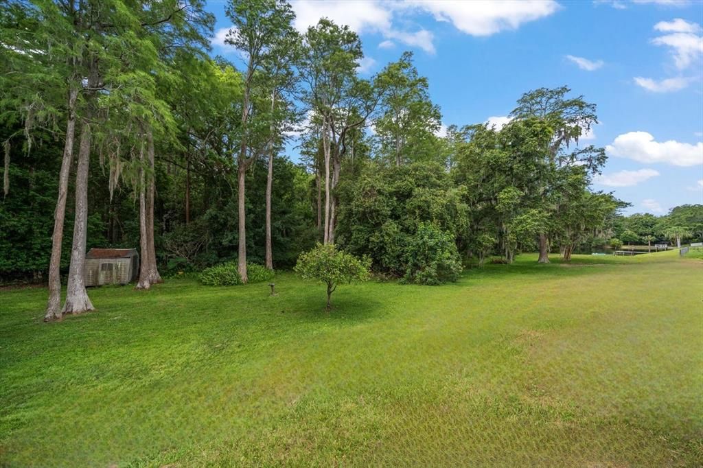 Backyard meets conservation land giving this home a beautiful nature view~