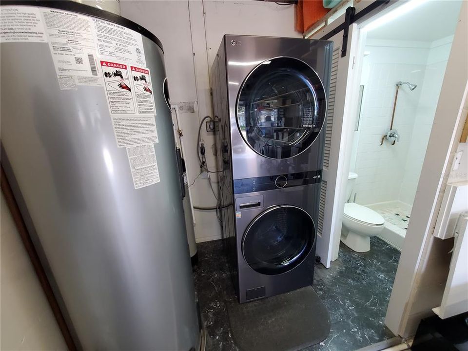 80 Gal Water Heater, Stack Washer and Dryer, Fully Functional Half Bath