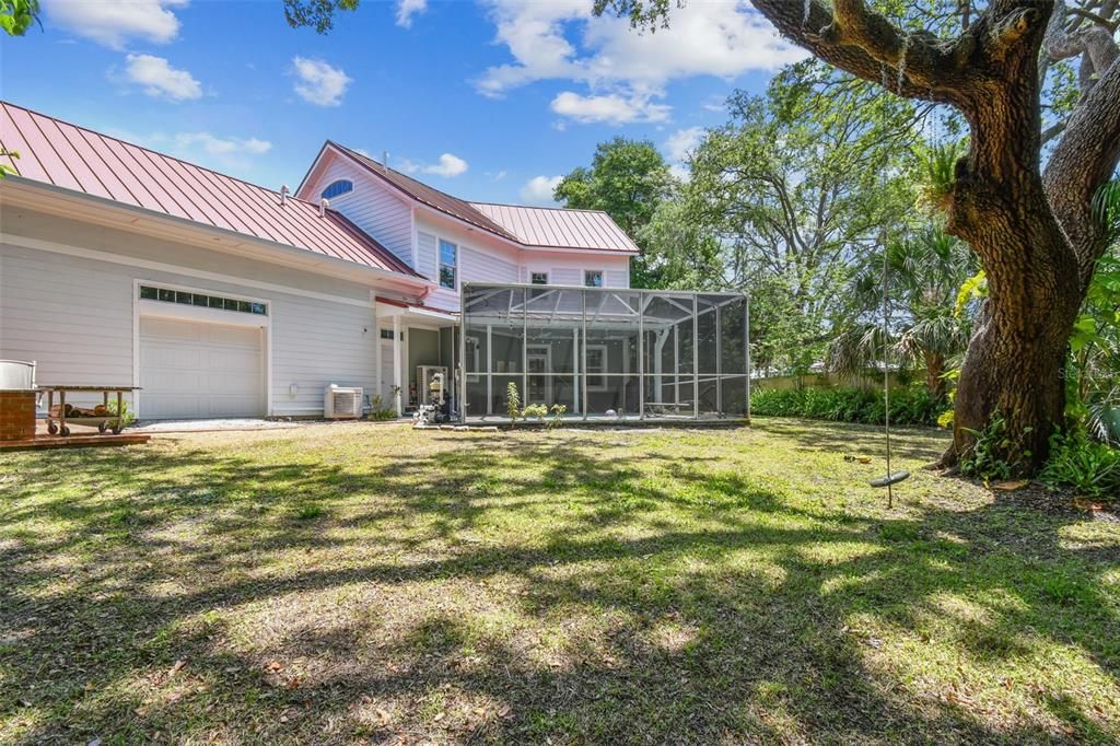 An add'l garage door leading to the backyard