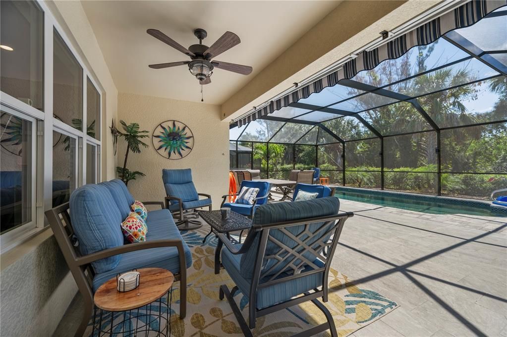 NEW Heated Pool, NEW Screened lanai & covered lanai space with ceiling fan & motorized awning