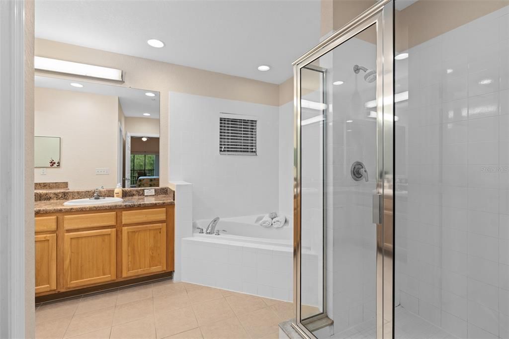Primary Bath has separate tub and shower, 2 walk-in closets.