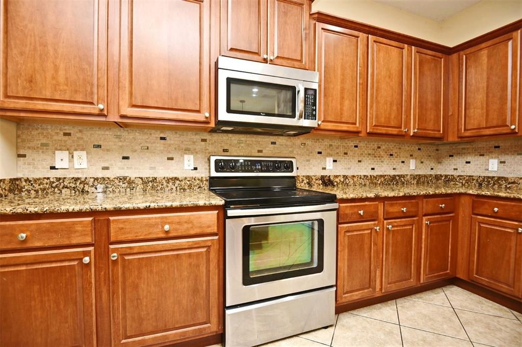 Ample Kitchen Cabinet and Counter Space