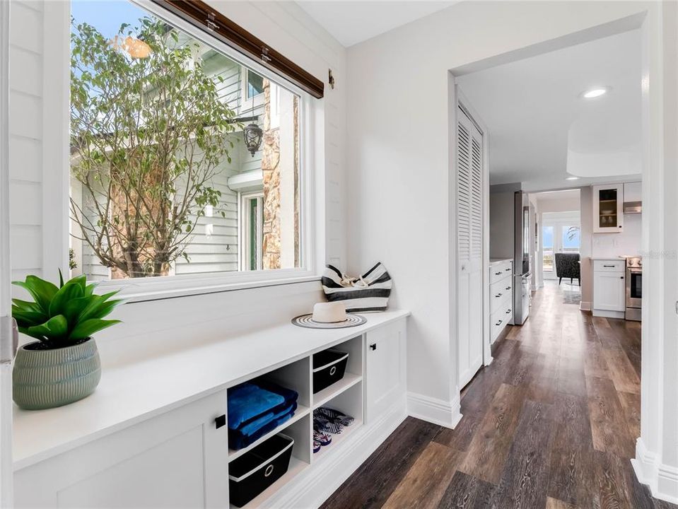 Tastefully designed kitchen remodel with the white cabinets and backsplash.  Newly installed vent to the outside.