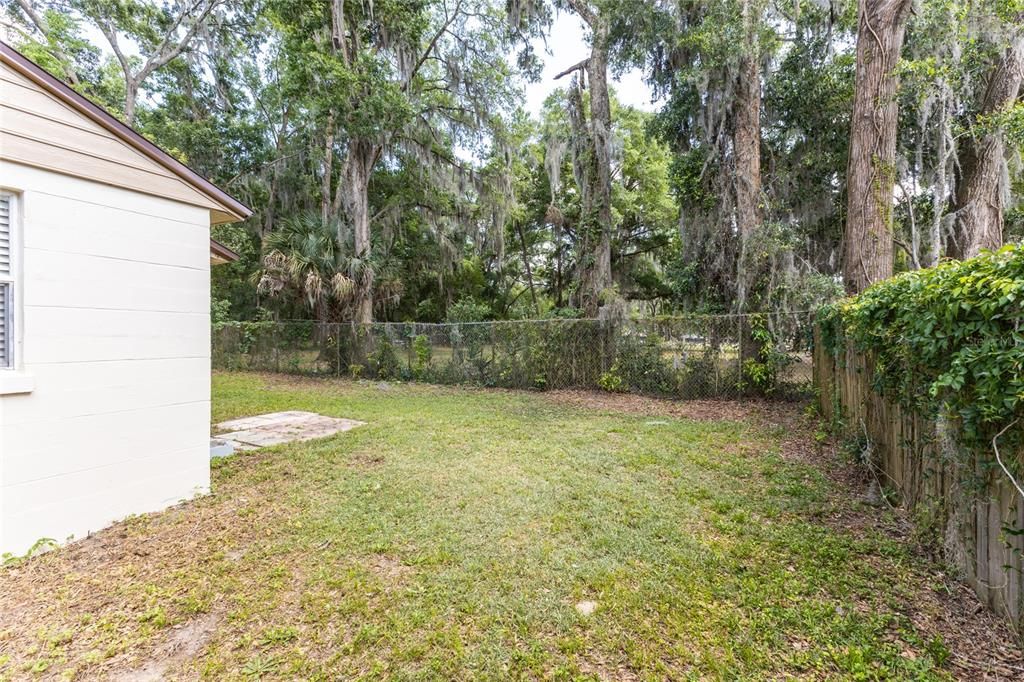 West side of home showing fenced back yard