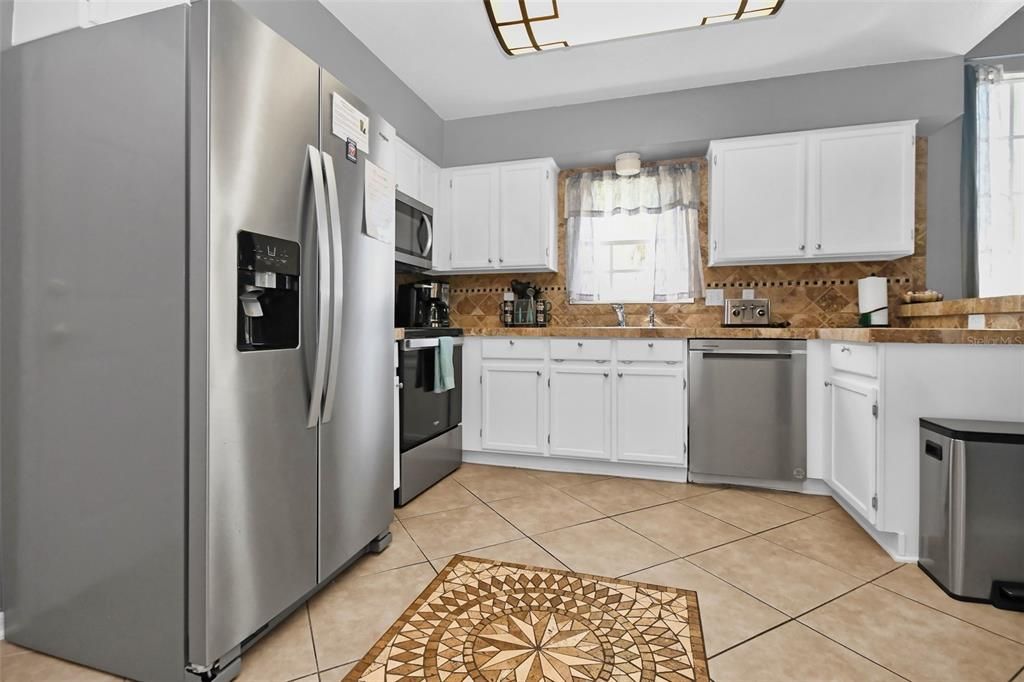 NEW STAINLESS STEEL APPLIANCES