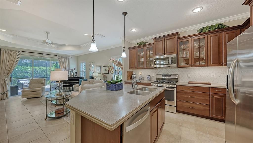 Glass cabinet doors with lighting and under cabinet lighting.