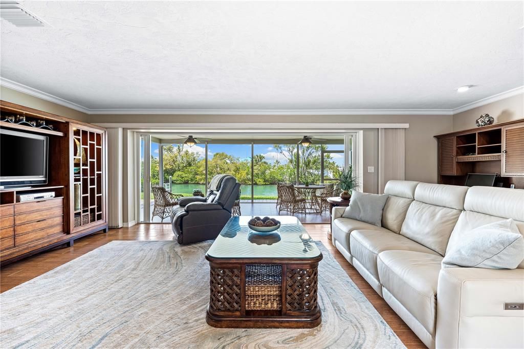 Living room with slider to lanai, view of the intracoastal.
