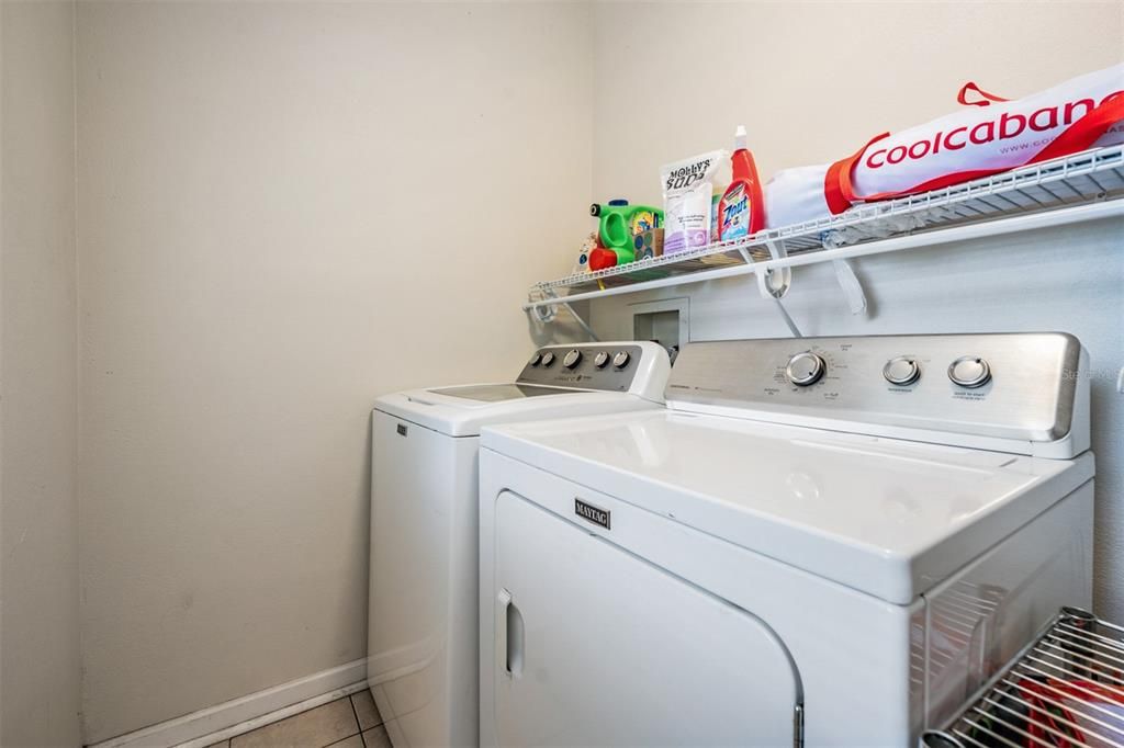 Inside Laundry room. Washer and dryer convey with the sale!