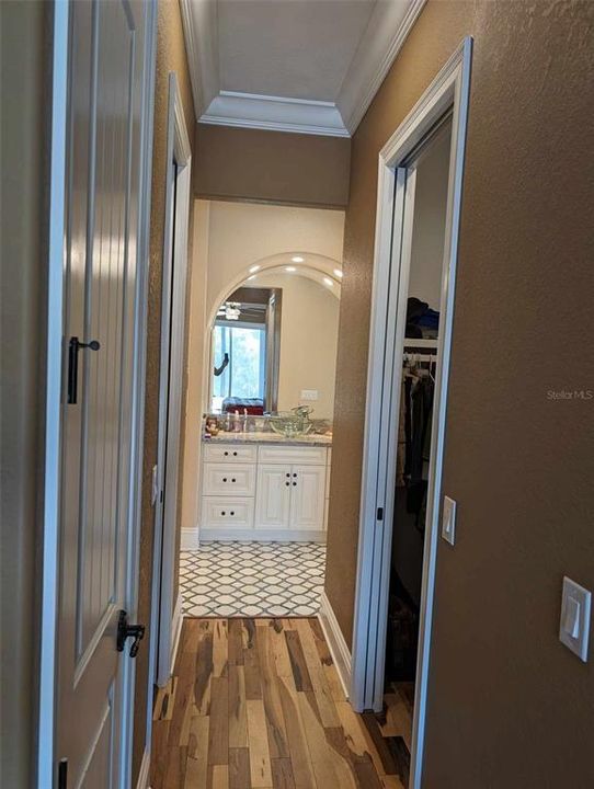 Hall with to master bedroom ensuite with two walk in closets.