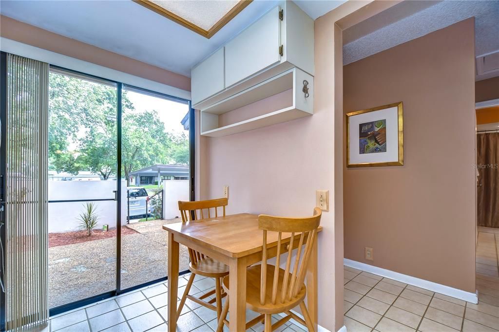 Breakfast nook with sliders to the front porch!