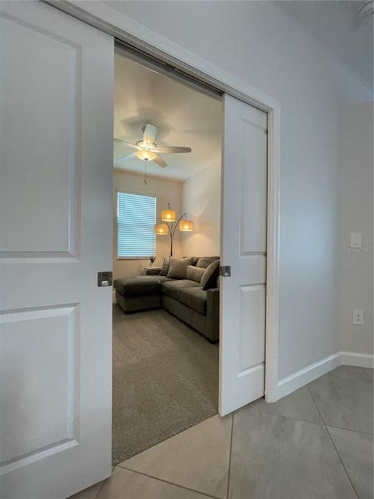 Bedroom 3 with Queen pullout sofabed and sliding wood doors for privacy