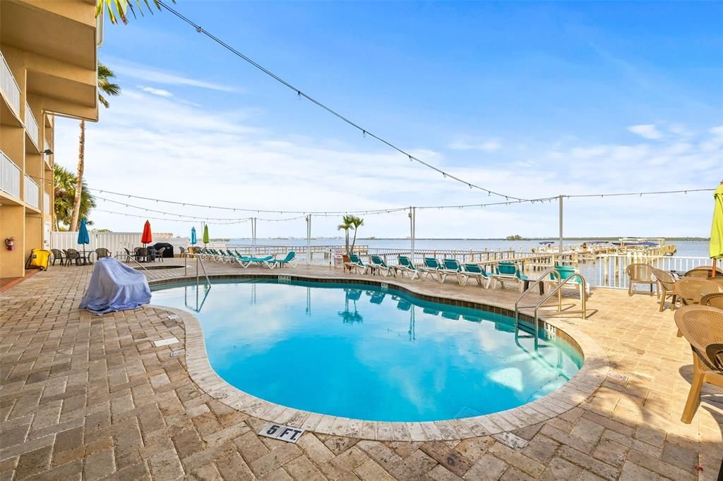One of two heated saltwater pools overlooking the marina and community boat slip.