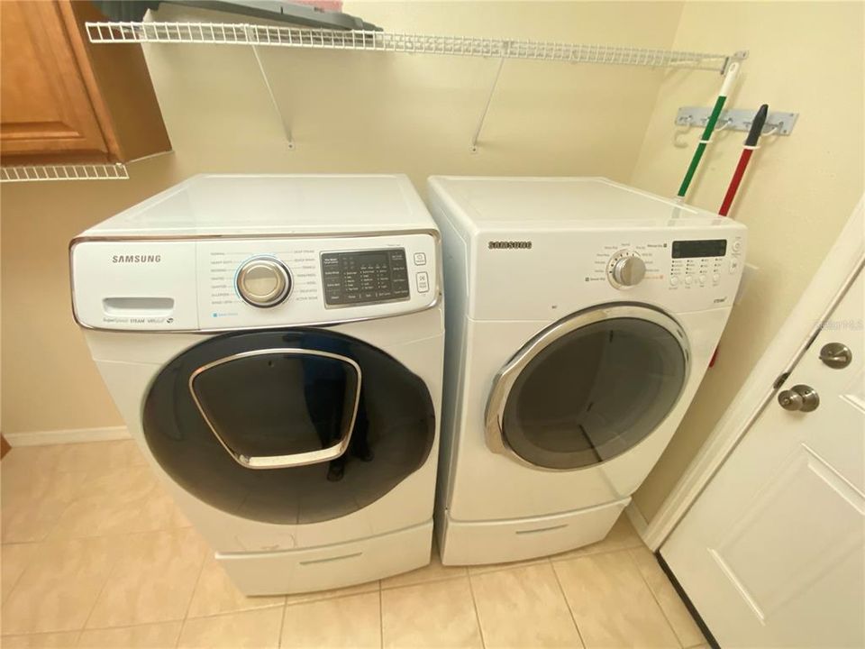 Utility Room - front load washer/dryer stays