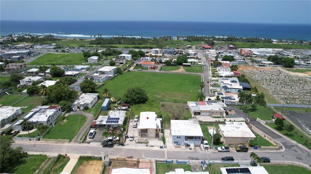 House with red DOT on Roof- for sale