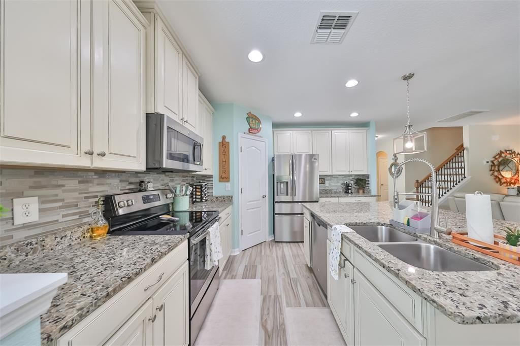 Granite counter tops, back splash, stainless steel appliances and upgraded cabinetry