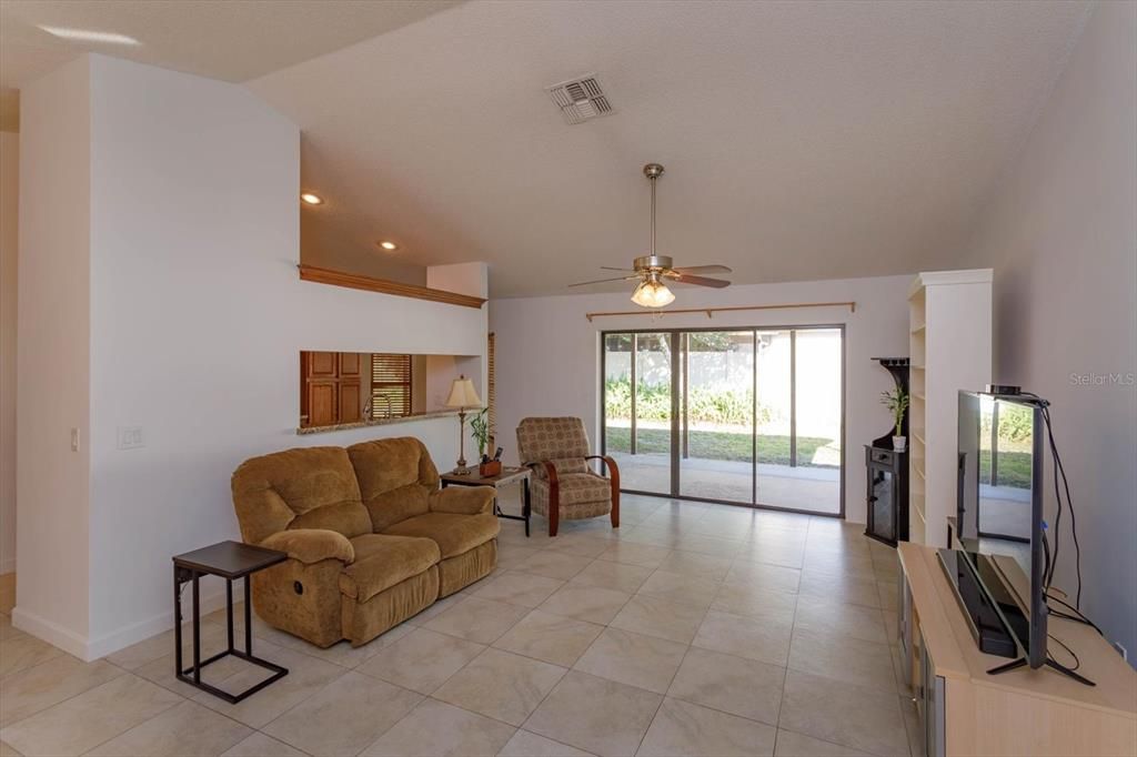 Living Room that opens to the expansive covered patio!