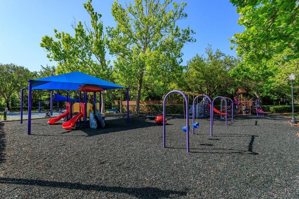 Community playground and park with tennis courts just steps away.