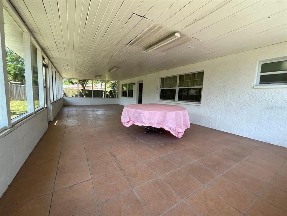Large covered screened back porch. Great for family gatherings or entertaining.