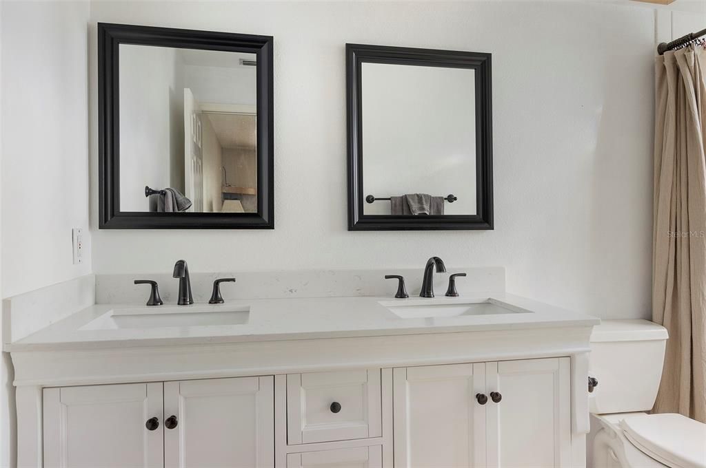 Updated dual sink vanity in Primary Bath