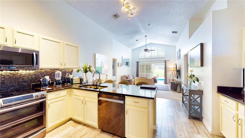 Kitchen-granite counters, tile and stainless appliances