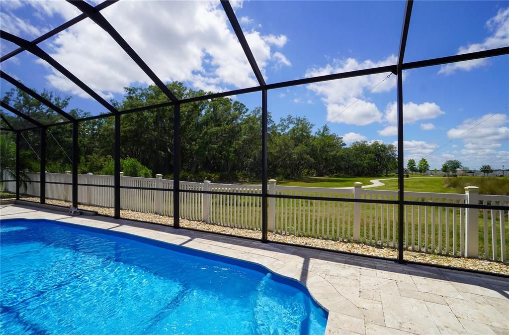 Notice the peaceful backyard setting overlooking the nature trails and nature preserve.