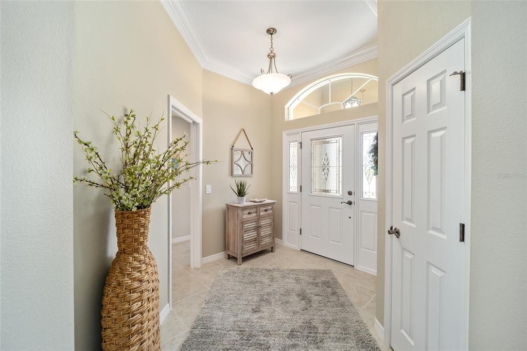 Guest bedrooms to the left and hall closet on the right looking toward the front door.