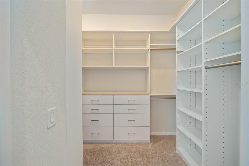 The primary closet is a masterpiece of organization!