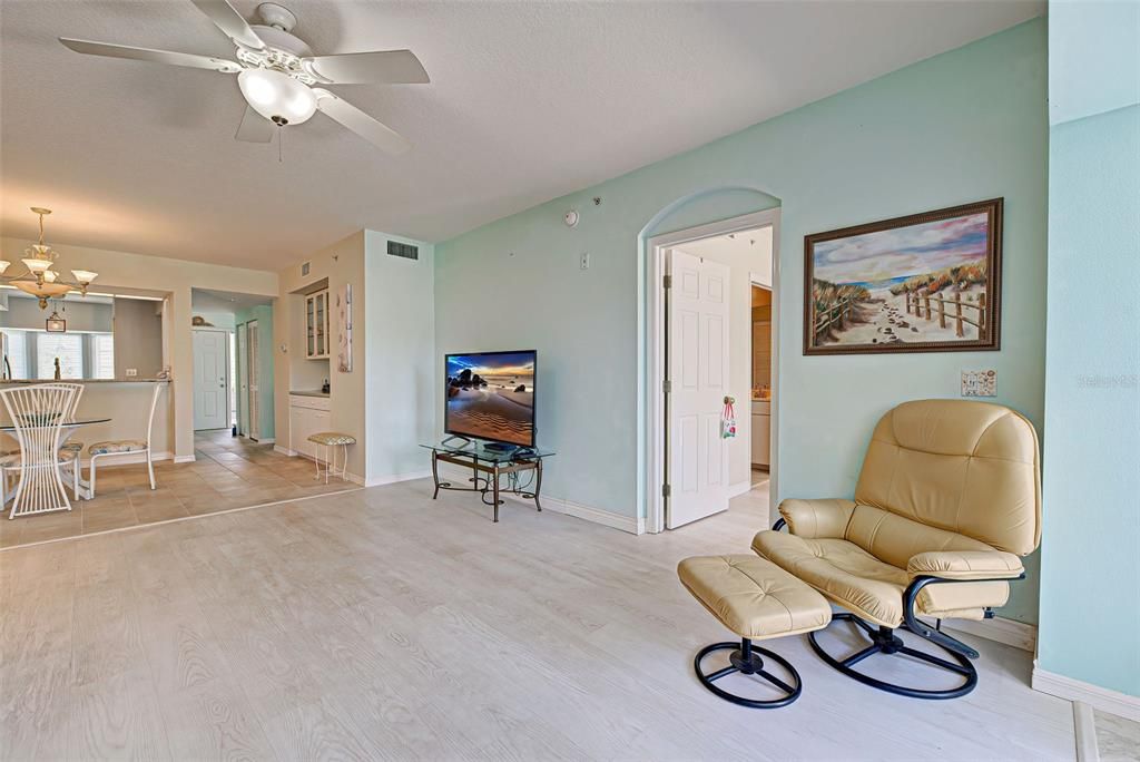 Condo has soothing, beachy colors and no carpet, making cleaning a breeze.