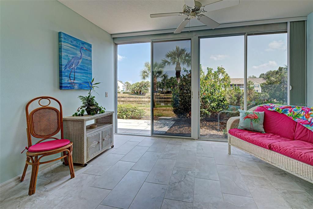 Relax, enjoy beautiful water views and read a favorite book in the air-conditioned Florida room.