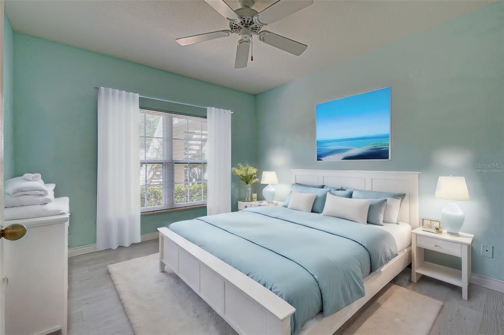 Virtually staged bedroom 2.  Sunny, private and roomy - your family and guests will feel right at home.