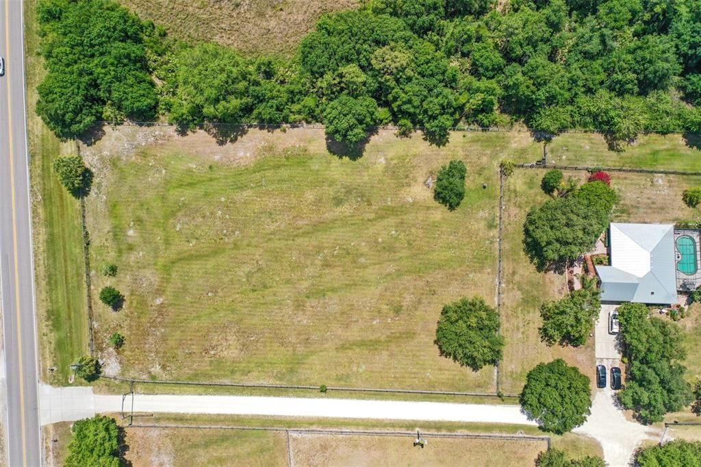 Aerial view of the pasture in front of the house.