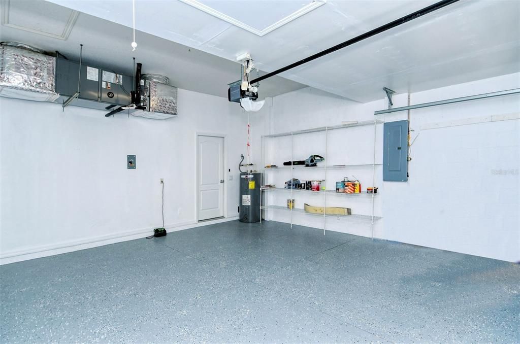 2 car garage with textured flooring
